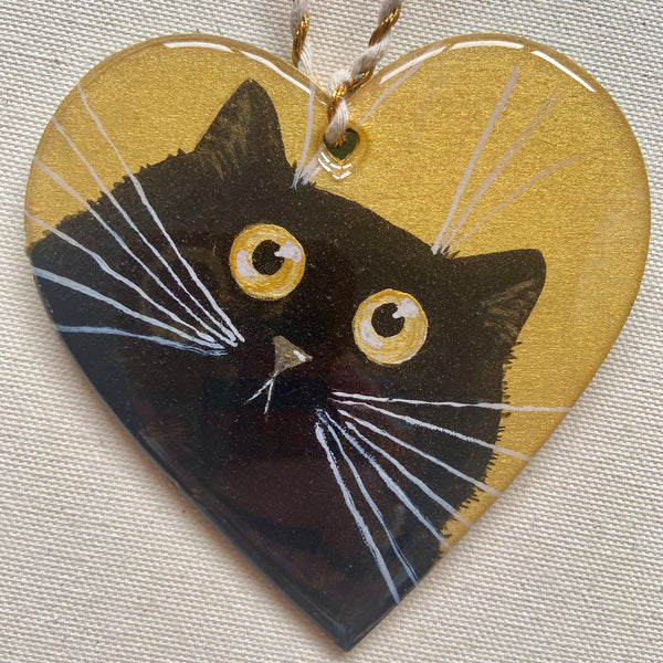 Black cat face on gold - ornament