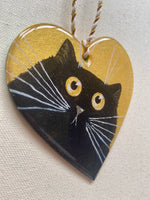 Black cat face on gold - ornament